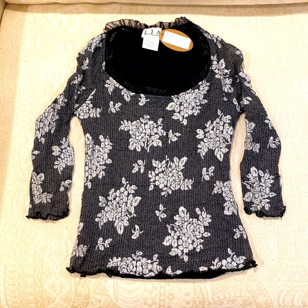 NWT. Lia Top.  Ruffled neckline   Tight fit